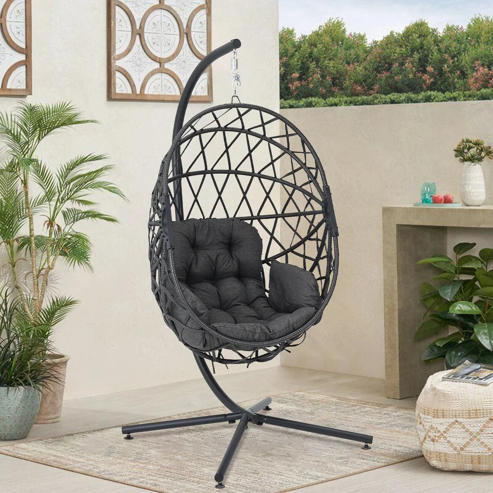 Woven outdoor egg chair with stand and cushion