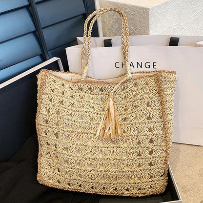 Hollow out tassel weaving straw handbag