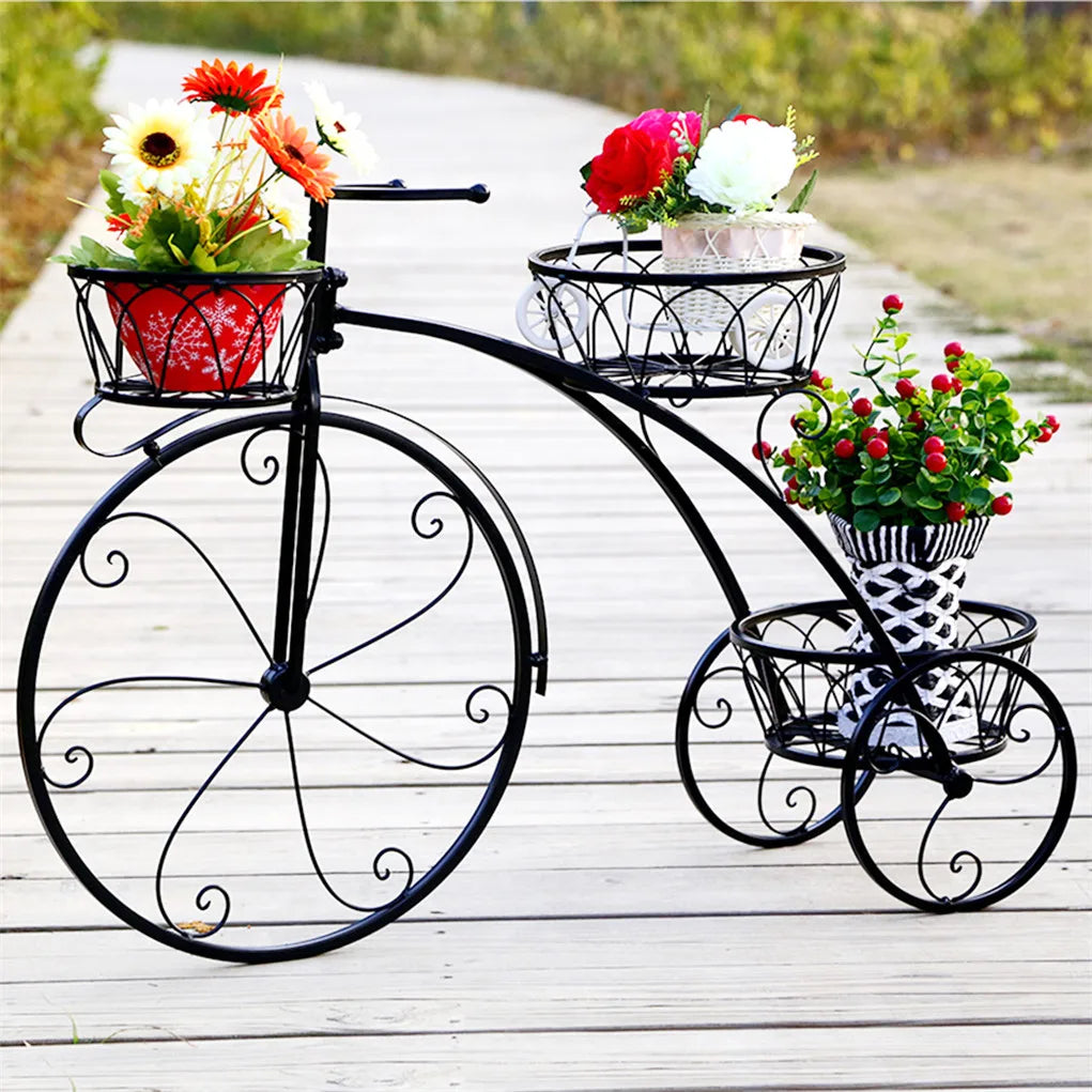 Wrought iron tricycle planter