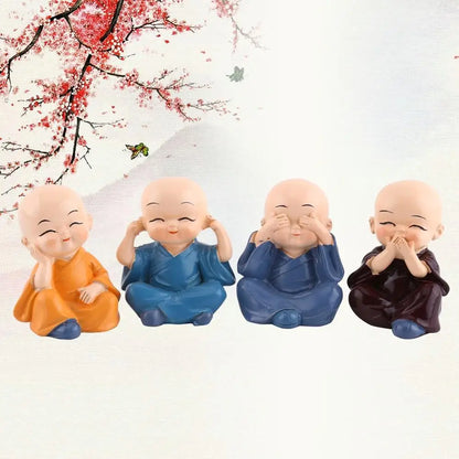 4 mini buddha monks resin figurines