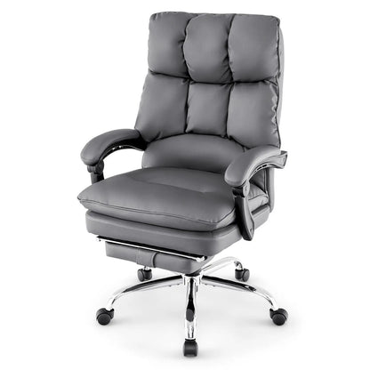 Ergonomic padded reclining chair with retractable footrest