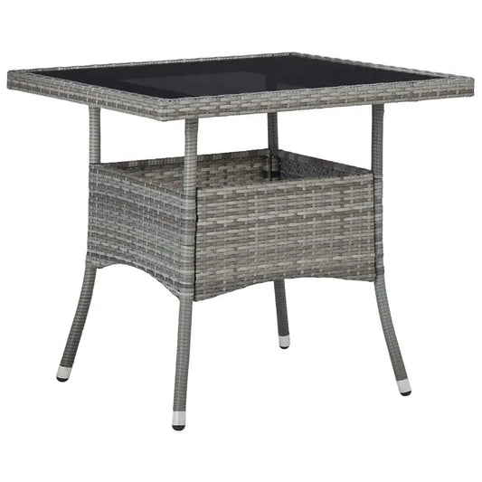 Poly rattan outdoor dining table with glass top