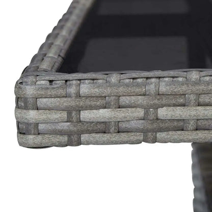 Poly rattan outdoor dining table with glass top