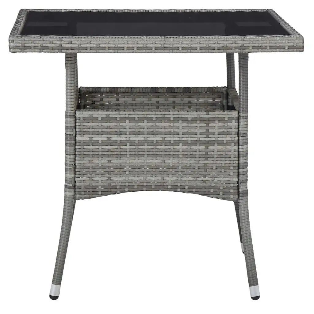 Poly rattan outdoor dining table with glass top