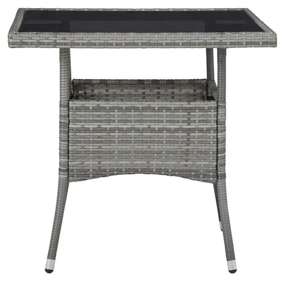 Poly rattan outdoor dining table with glass top