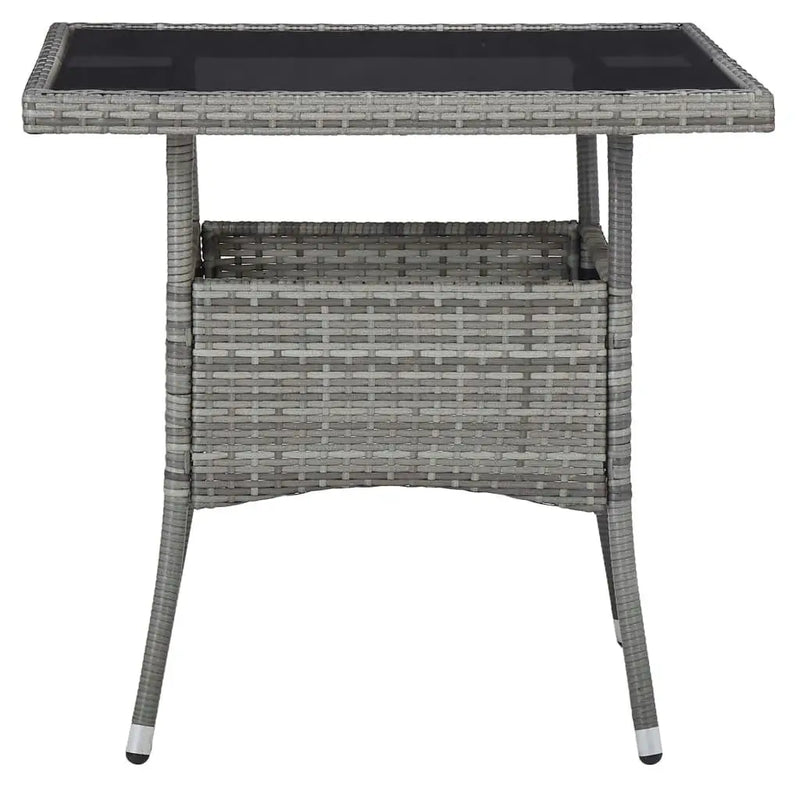 Poly rattan outdoor dining table with glass top
