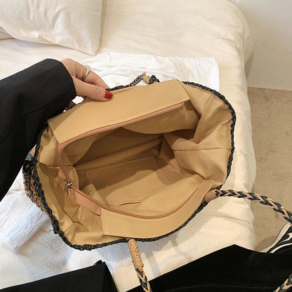 Hollow out tassel weaving straw handbag