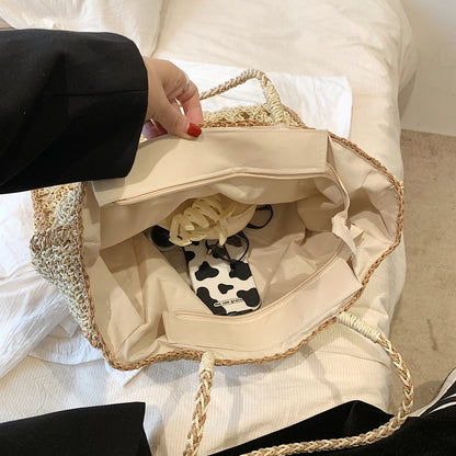 Hollow out tassel weaving straw handbag
