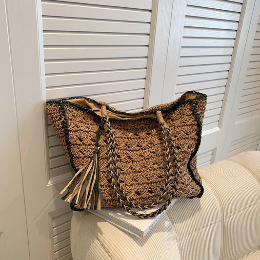 Hollow out tassel weaving straw handbag